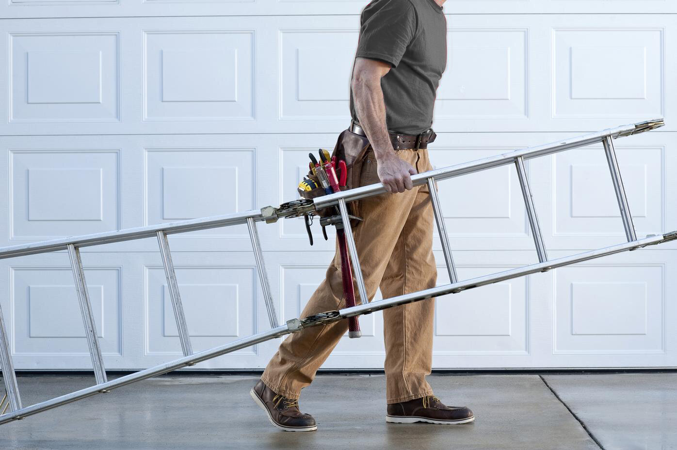 Pros and Cons of DIY Same-Day Garage Door Panel Repair